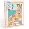 The Diamond Painting Kit - Positano by Petra Lidze features colorful Mediterranean-style houses on a seaside hillside, orange trees overhead, and a pastel pink border on the box.