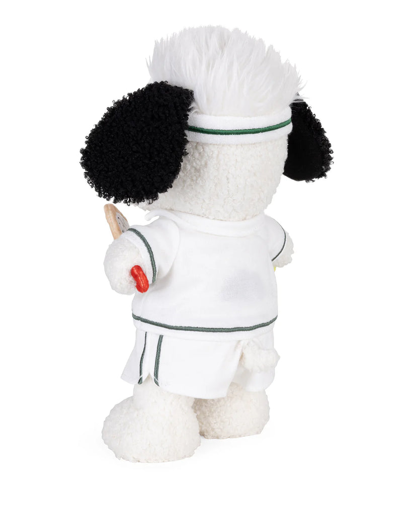 Bon Ton Toys presents the Plush Peanuts Snoopy Tennis: a cute Snoopy plush dressed in a white tennis outfit and headband, holding a wooden tennis racket, with fluffy white fur and black ears.