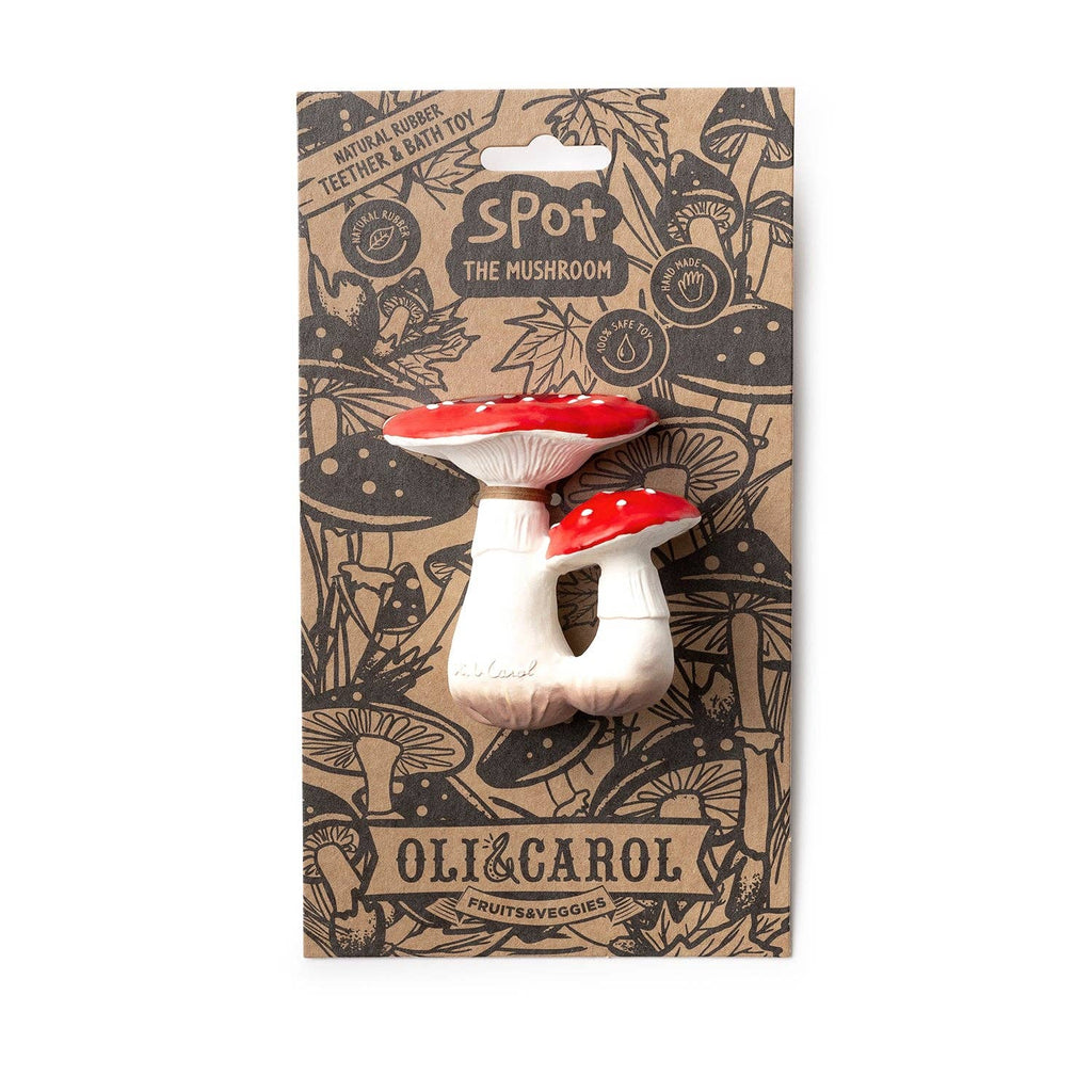 Two red and white Spot the Mushroom Teething Toys by Oli & Carol are attached to eco-friendly cardboard packaging with cute illustrations, ideal for sensory play and teething, made from natural rubber.