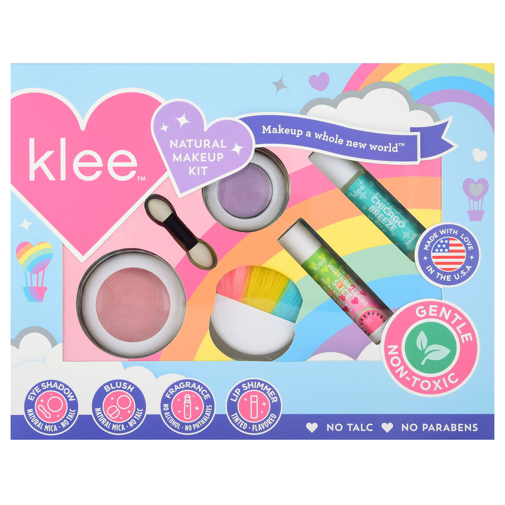 Klee Naturals Makeup Kit - After the Rain- Rainbow Dream in a heart-decorated box, including a purple eyeshadow, pink blush, blush brush, fragrance roller, and a lip shimmer balm.