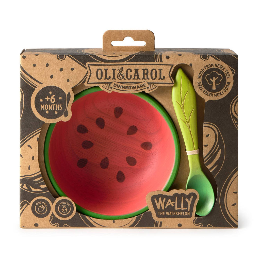 The Wally the Watermelon Bowl & Spoon Set by Oli & Carol includes a non-toxic watermelon-themed bowl and a green leaf-shaped wooden spoon. Packaged for babies 6 months+, it's a boxed baby dinnerware set.