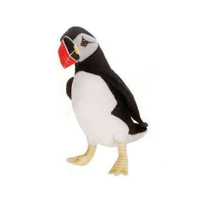 A Puffin Bird Stuffed Animal, artisan crafted and standing isolated on a white background, featuring a black and white body, colorful beak, and webbed yellow feet.
