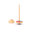 The Wooden Spinning Top - Long Stem, Red & Blue features a maple wood body and vibrant rim, standing upright beside its rounded lid on a white background—a delightful sustainable toy suitable for all ages.