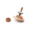 A sustainable wood toy, the Wooden Spinning Top - Sheep features a sheep face, colorful rings, and a brown circular piece beside it on a white background—a charming pick for timeless play.