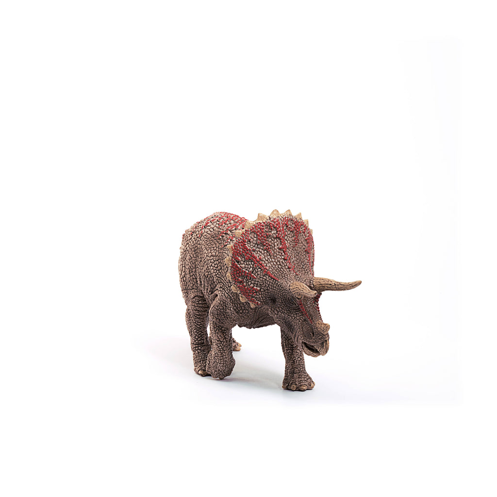 The Schleich Triceratops Dinosaur Toy is a realistic addition to any dinosaur collection, featuring a textured brown body with red markings and positioned slightly left on a white background.
