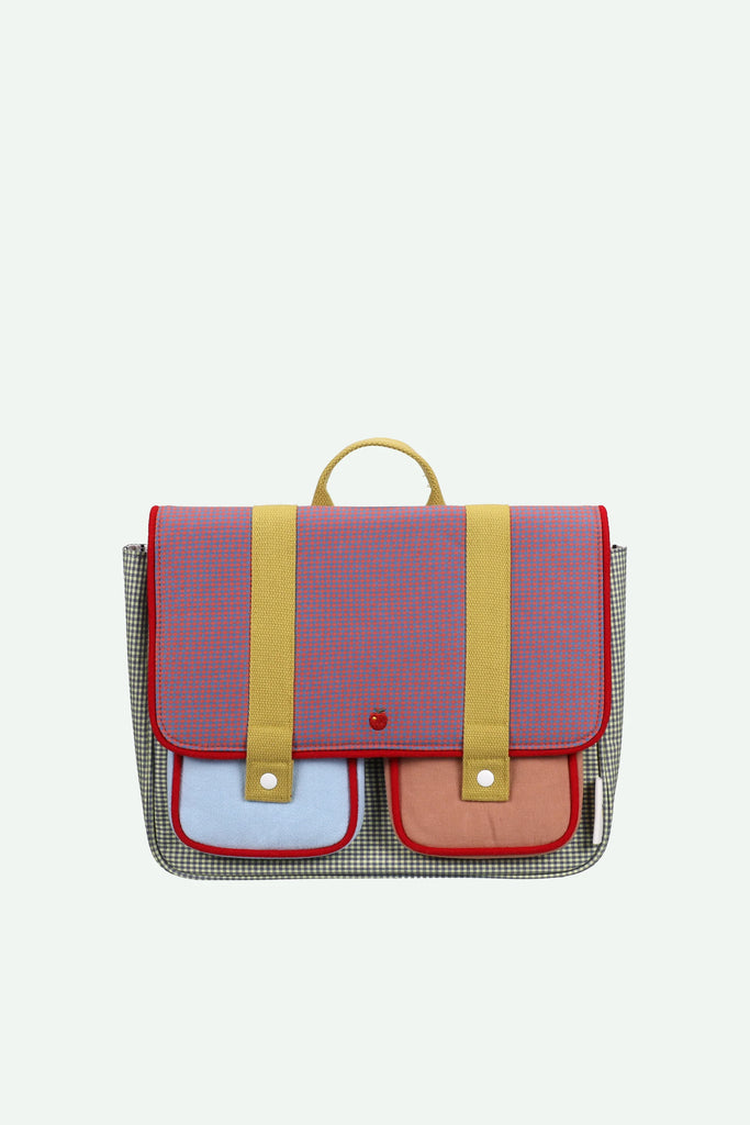 The Sticky Lemon School Bag | Lemon Tree | Gingham Midnight + Moon features a purple and red flap, yellow straps and handle, adjustable shoulder handles, and two front pockets—light blue and orange—on a black-and-white patterned base.