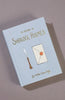 The Return of Sherlock Holmes | Collector's Edition is a light blue hardcover book featuring quill and sealed envelope illustrations on the cover.
