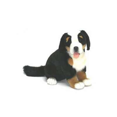 The Bernese Puppy Dog Stuffed Animal is a hand-sewn plush toy that closely resembles a Bernese Mountain Dog puppy, featuring a black, white, and brown fur pattern. It boasts realistic details and is designed in a sitting position with its tongue slightly sticking out.