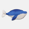 The Minke Whale Pencil Case is a 100% cotton pouch, handcrafted in Spain, shaped like a blue whale with a white belly, stitched black lines, small fins, a tail, and a zipper along its back.