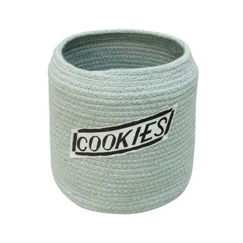 A light gray, handcrafted Basket Cookie Jar with a black and white label that reads "cookies" on the front. The jar has a simplistic and cozy design.