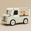 The Maileg Café Van Set features a pastel green and white wooden van with "Café" and coffee cup artwork, black string lights, and white wheels—ideal for LouiMax or Little Brother/Sister Mice—displayed on a neutral background.