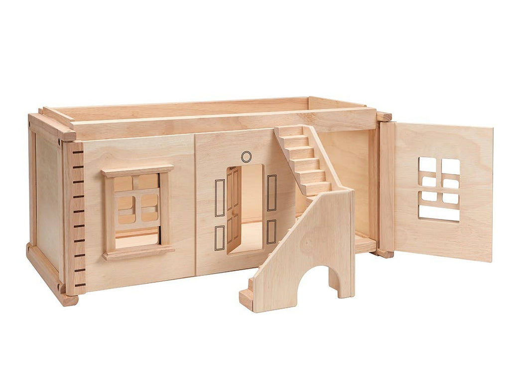A wooden dollhouse featuring an open front, stairs, windows, and a hinged right-side door. Compatible with the PlanToys Victorian Dollhouse Basement Floor and perfect for accessories. Crafted from natural, unfinished wood.