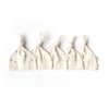 Five Organic Baby Hat – Natural, made from cream-colored organic cotton and GOTS certified, are arranged in a row. Each features small animal and dot patterns with a side fabric tag. The background is plain white.