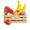 The Smoothie Fruit Wooden Market Crate (ships in one week) holds colorful wooden fruits—two bananas, a watermelon slice, an orange, and two strawberries—perfect for early learning and imaginative play.