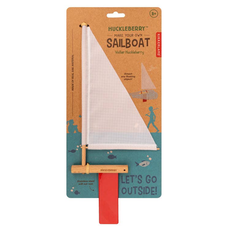 The Huckleberry Make Your Own Sailboat kit comes in packaging featuring a wooden boat with a white sail and red keel. Designed for ages 8+, it encourages outdoor play—perfect for kids to build their own sailboat adventure!.
