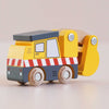 A No. 37 GT210 Eddie yellow wooden excavator construction toy, made in England, featuring red and white stripes, black wheels, and a movable arm and bucket, is shown on a light background.