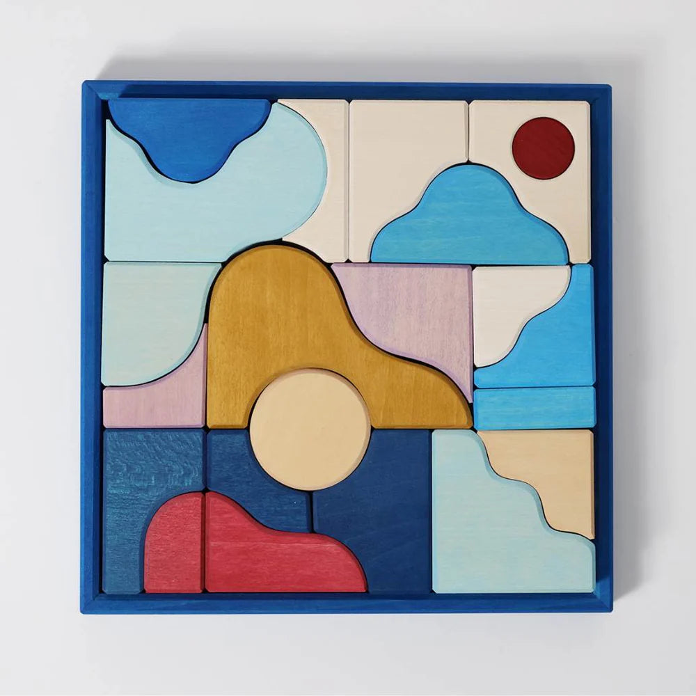 The Grimm's Small Building Block Set - Wave features a square tray of vibrant, abstract wooden pieces arranged in artistic wave patterns—ideal for imaginative play, creative landscapes, or building set-inspired sculptures.