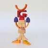 A bird-like creature constructed from Grimm’s Building World - Desert Sand, featuring orange, red, purple, and natural wood blocks in an imaginative free-build.