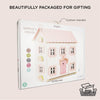 Sophie's Wooden Dolls House by Le Toy Van features pastel pink and white colors, a cotton handle, FSC-certified wood, and eco-friendly 100% recyclable packaging—perfect for gifting.