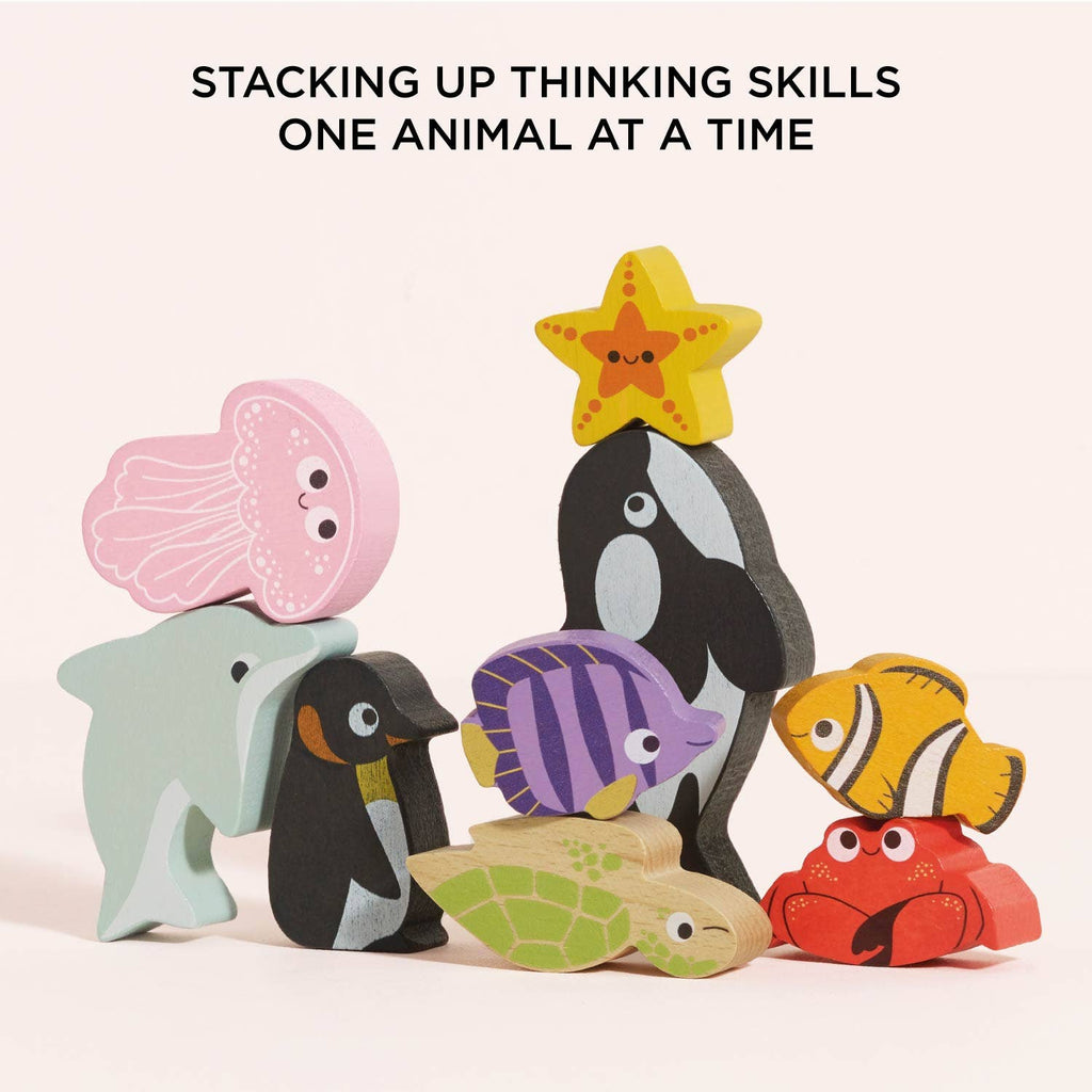 Stack up thinking skills with the Ocean Life Stacking Animals & Bag—colorful wooden sea creatures like a dolphin, penguin, and jellyfish make the perfect sensory play toy for kids!.