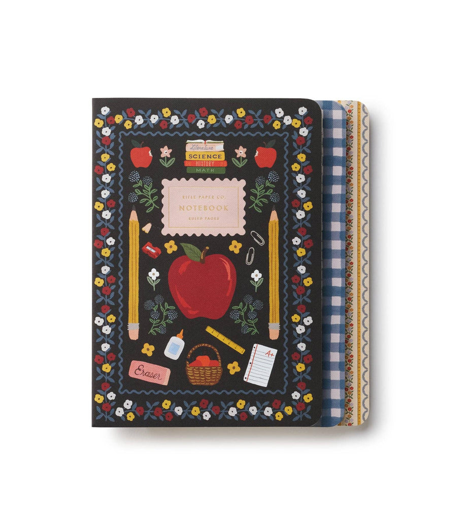 Introducing the Assorted Set of 3 Schoolhouse Notebooks—a vibrant collection featuring a floral-bordered cover adorned with apple, pencil, and other school-themed illustrations. The set includes two additional charming edge designs: classic blue plaid and cheerful yellow with white dots. Each notebook boasts lay-flat binding for comfortable writing on every page—perfect for your school notebook collection.
