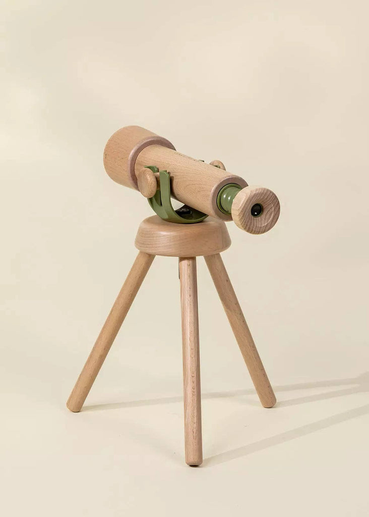 The Wooden Tripod Telescope – 15x Zoom features green accents, a simple three-legged wooden stand, and is displayed against a plain beige background.