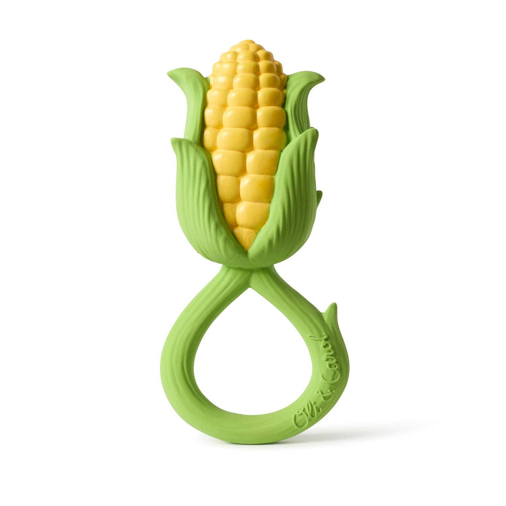 The Corn Rattle Toy Rattle is a yellow, corn cob-shaped sensory teething toy with green husk details and an attached looped handle at the bottom for easy gripping.