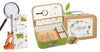 The Moulin Roty Botanist Suitcase is a children’s nature observation kit with a magnifying glass, illustrated fox and hedgehog, “Le botaniste” and “La loupe” boxes, botanical designs, flower press, all packed in a charming suitcase for young explorers.