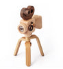 The Father’s Factory Super 16 Pro Wooden Toy Camera with Tripod features a kaleidoscope viewfinder, rounded shapes, and a blend of light and dark wood accents—offering a simple, whimsical design perfect for imaginative pretend-play.