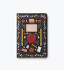 The Assorted Set of 3 Schoolhouse Notebooks features stitched binding and black covers adorned with a charming red apple, flowers, pencils, an eraser, notebook, basket, and vibrant small illustrations—all encircled by a lovely floral border. Perfect as school notebooks, these are thoughtfully designed with convenient lay-flat binding.