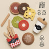 The Gourmet Hamburger Set, made from sustainable wood, includes burger bun pieces, cheese, tomato, lettuce, fries in a red box, and a drink cup. Fun illustrations highlight social and coordination skills. Ships in one week.