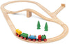 Celebrate the BRIO World 65th Anniversary Train Set, featuring a classic wooden looping track, red, green, and yellow train, two green trees, and a small bridge support.