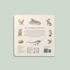 The back cover of Our Big Book of Animals (Board Book) features watercolor animal illustrations like chicken, lizard, rabbit, and narwhal, plus descriptive text, a barcode, and a grid of smaller animal vocabulary images at the bottom.