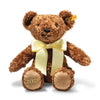 The Steiff Cosy Year Bear 2026 13" is a brown teddy bear with soft fur, light brown paw pads, "2026" embroidered on one paw, a yellow ribbon, and a yellow ear tag—making it a charming New Year gift or keepsake.