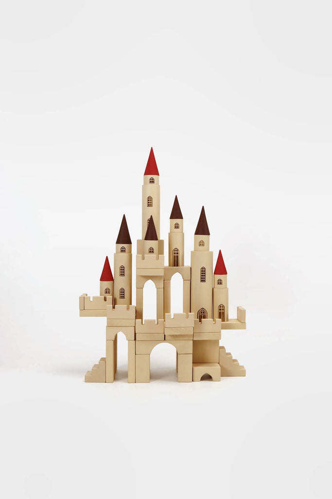 The Great Kingdom Building Set is a wooden toy castle featuring smooth edges, multiple towers adorned with red and brown conical roofs, arches, and stairs. All pieces are meticulously crafted using non-toxic paint and are displayed against a plain white background.