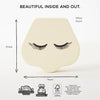 The Vanity Star Beauty Kit features a cream-colored, nose-shaped wooden makeup toy with closed eyes and long lashes, ideal for imaginative play. Measures 65x70x20mm. "Beautiful inside and out." appears above; sustainability icons shown below.