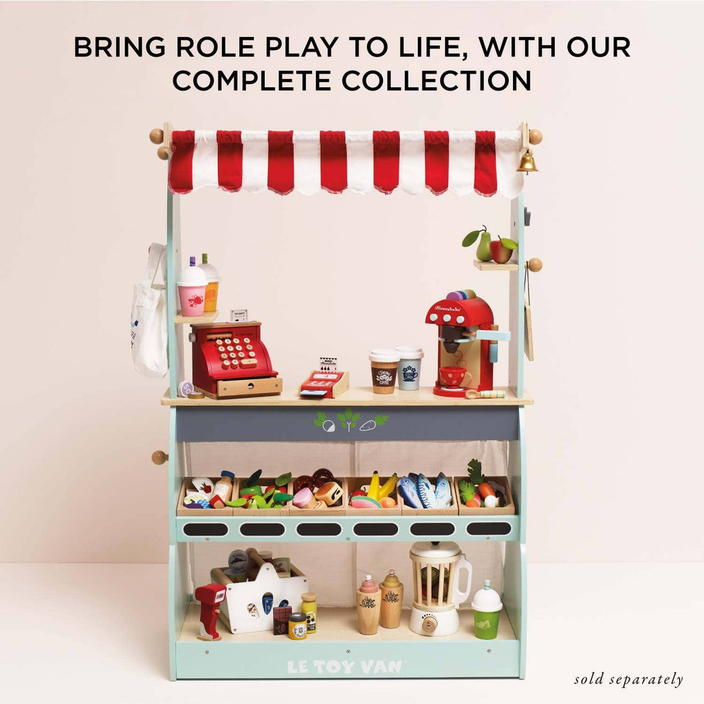 Bring role play to life with our wooden play shop—featuring a red and white striped canopy, toy cash register, grocery shelves, play food items, and the Bakery & Patisserie Wooden Market Crate.