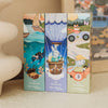 Three illustrated puzzle boxes from the “Sky High Friends 40 Piece Mini” collection—each a whimsical challenge for young minds—feature a diver swimming with fish, a rabbit in a hot air balloon, and a fox driving a race car; each box is labeled “40 pieces” and “once upon a puzzle,” making them perfect for children.