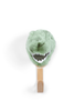The Coat Hanger - T-Rex Dino features a green plush dinosaur head with white felt teeth and an open mouth, mounted on a light wooden wall hook and shown against a white background.