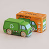 A small green wooden recycling truck with a white recycle symbol stands in front of its orange box labeled “No. 36 GT200 Rudy | Made in England” and “Le Toy Van.” Perfect for sustainable play, the box features an illustration of the truck alongside various icons.