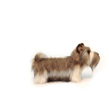A small, long-haired Terrier Dog Stuffed Animal with a brown and white coat stands in profile facing right against a plain white background, showcasing the lifelike detail typical of realistic plush toys.