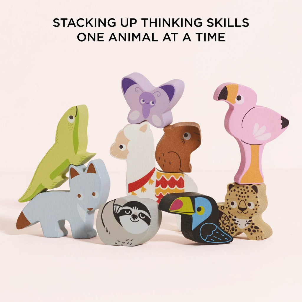 Nine vibrant wooden animal blocks—including butterfly, flamingo, llama, fox, sloth, toucan, leopard, and lizard—from the Andes Stacking Animals & Bag are stacked on a white background. Text: “Stacking up thinking skills one animal at a time!”.