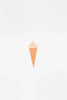 A minimalist image of a simple, cone-shaped Handmade Ice Cream Cone, set against a plain white background with soft, blurry gray circles.