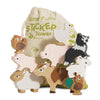 The Farmyard Stacking Animals and Bag is an eco-friendly wooden toy set featuring colorful figures—a pig, sheep, dog, chicken, duck, cow, rooster, and llama—stacked in front of a cloth bag labeled "Sunny Farm Stacker Tower.