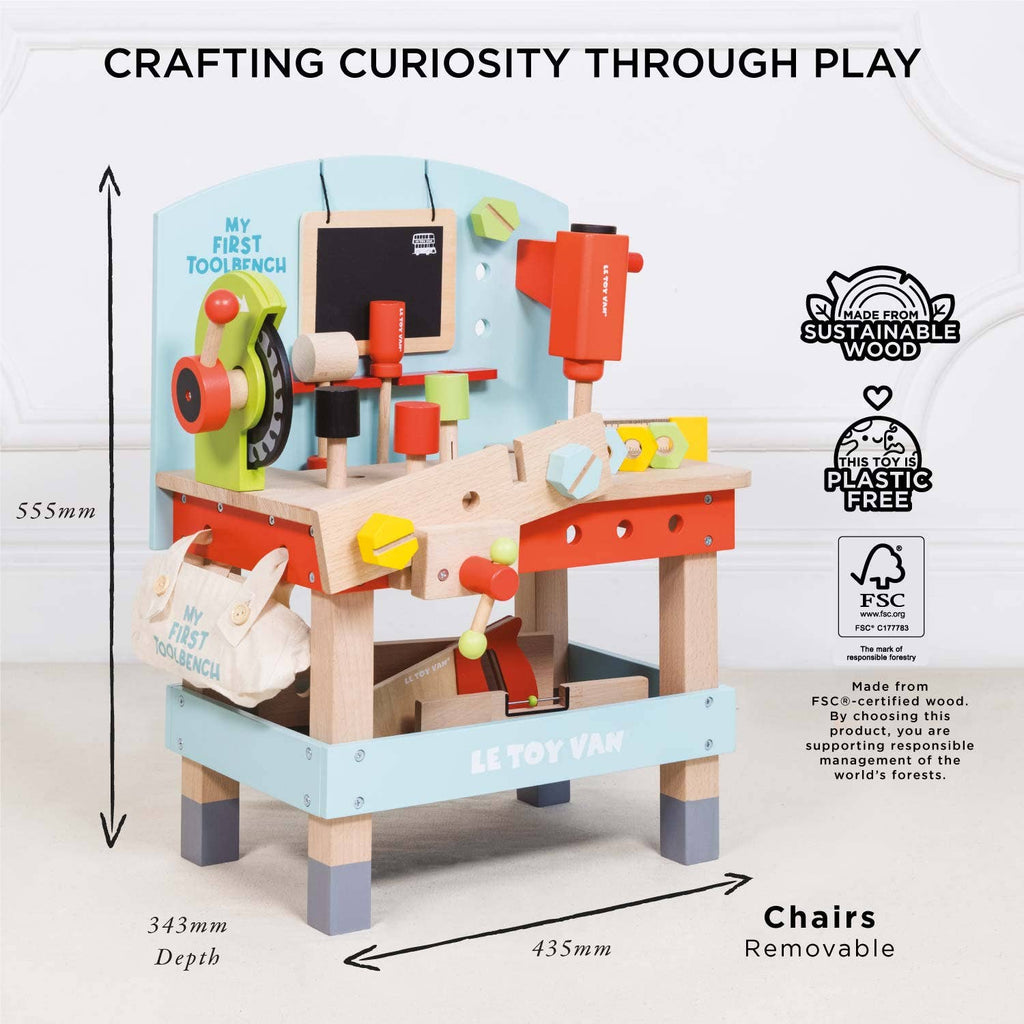 The Wooden Tool Bench is a colorful, plastic-free pretend play set for children, made from sustainable wood. It features labeled dimensions (555mm height, 343mm depth, 435mm width) and includes tools, accessories, and removable chairs.