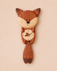 The Handmade Wooden Fox Wall Clock features a cute, cartoonish fox design with the clock face on its belly and a swinging tail pendulum. Crafted from wood in brown shades with lighter and darker accents, this charming wall clock is perfect for woodland nursery decor or as an adorable accent in any room.