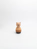 The Sabo Concept Bear Stacker - Beige features a simple wooden design with a round head and body, painted in light and dark brown stripes, perfect for stacking ring games.