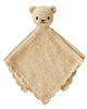The Cuddle + Kind Organic Cotton Baby Bear Lovey (Honey) is a beige hand-knit baby blanket with a plush bear head, black eyes and nose, round ears, and a scalloped edge—an adorable, fair trade baby gift.