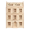 The Grand Victorian Dollhouse features four wooden floors, symmetrical windows, a central door, two roof dormer windows, an attic, and detailed trim—all in a light natural wood finish.