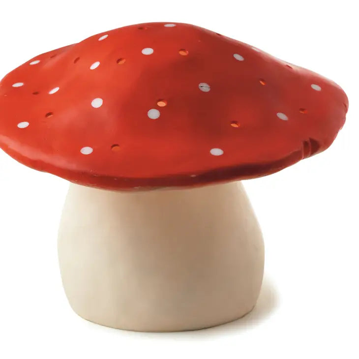 A vibrant Medium Red Mushroom Lamp with white spots on its cap and a stout white stem, designed as a nursery lamp, isolated on a white background.